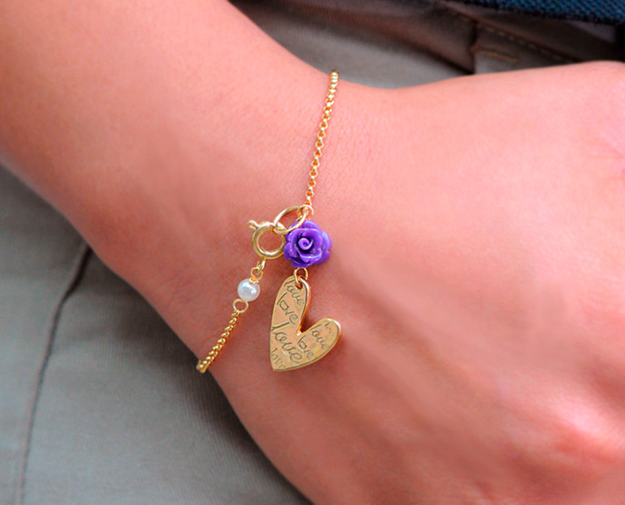 Pulsera corazon y flor morada x und