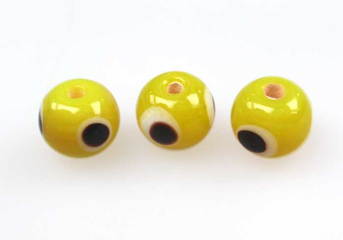 Vidrio hindú 8mm redondo GLO 3/024 ojo amarillo u