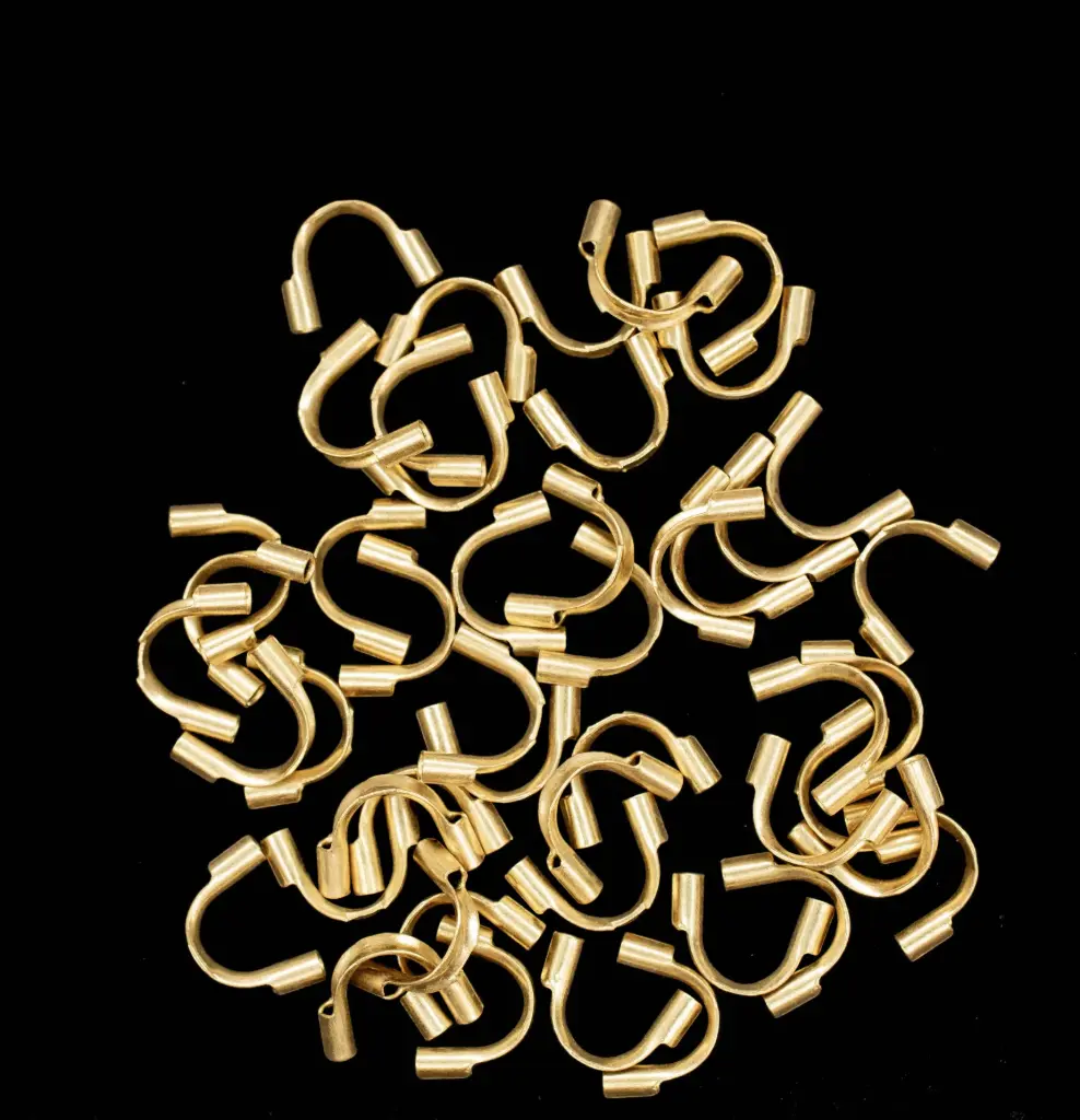 Terminal protector acero dorado 5mm x 100 unds